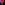 Woman exhaling smoke in the dark