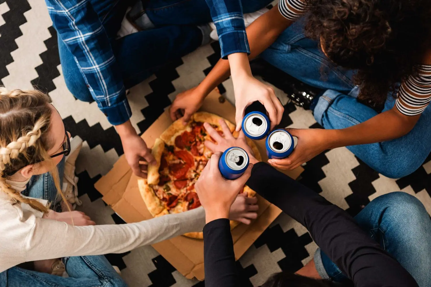 Group of friends having pizza.