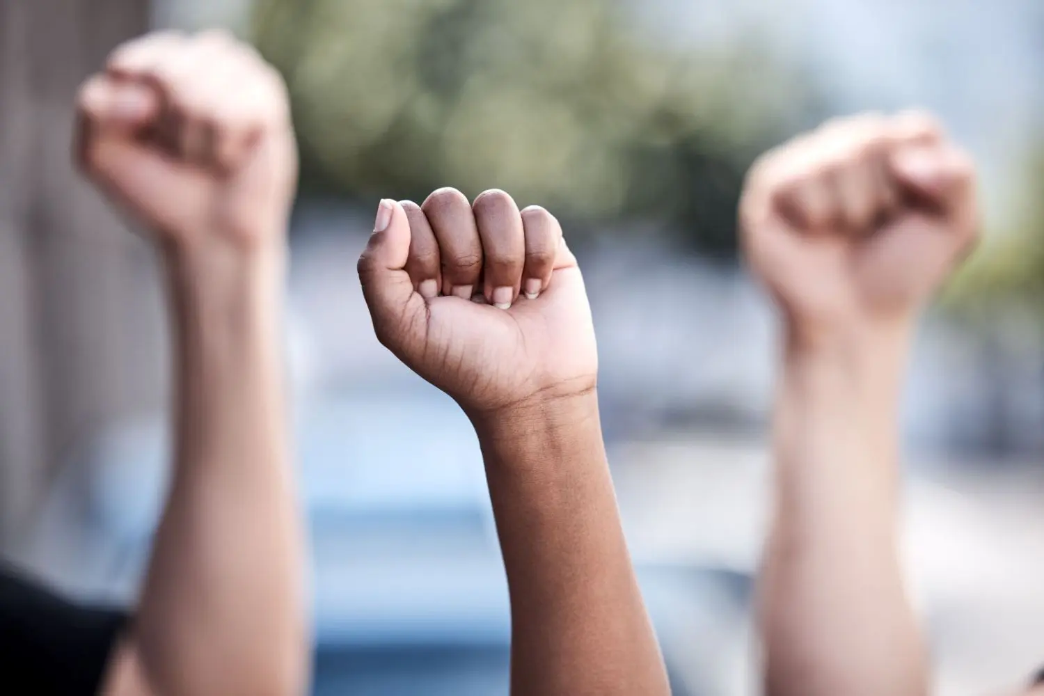 Fists and hands while protesting.