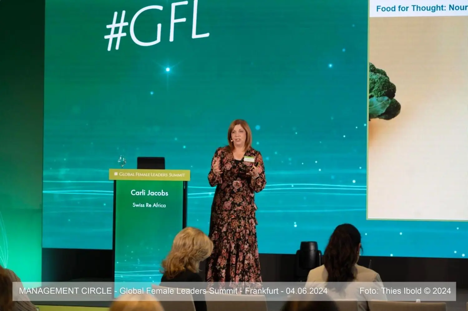 Photo of Carli Jacobs on the stage.