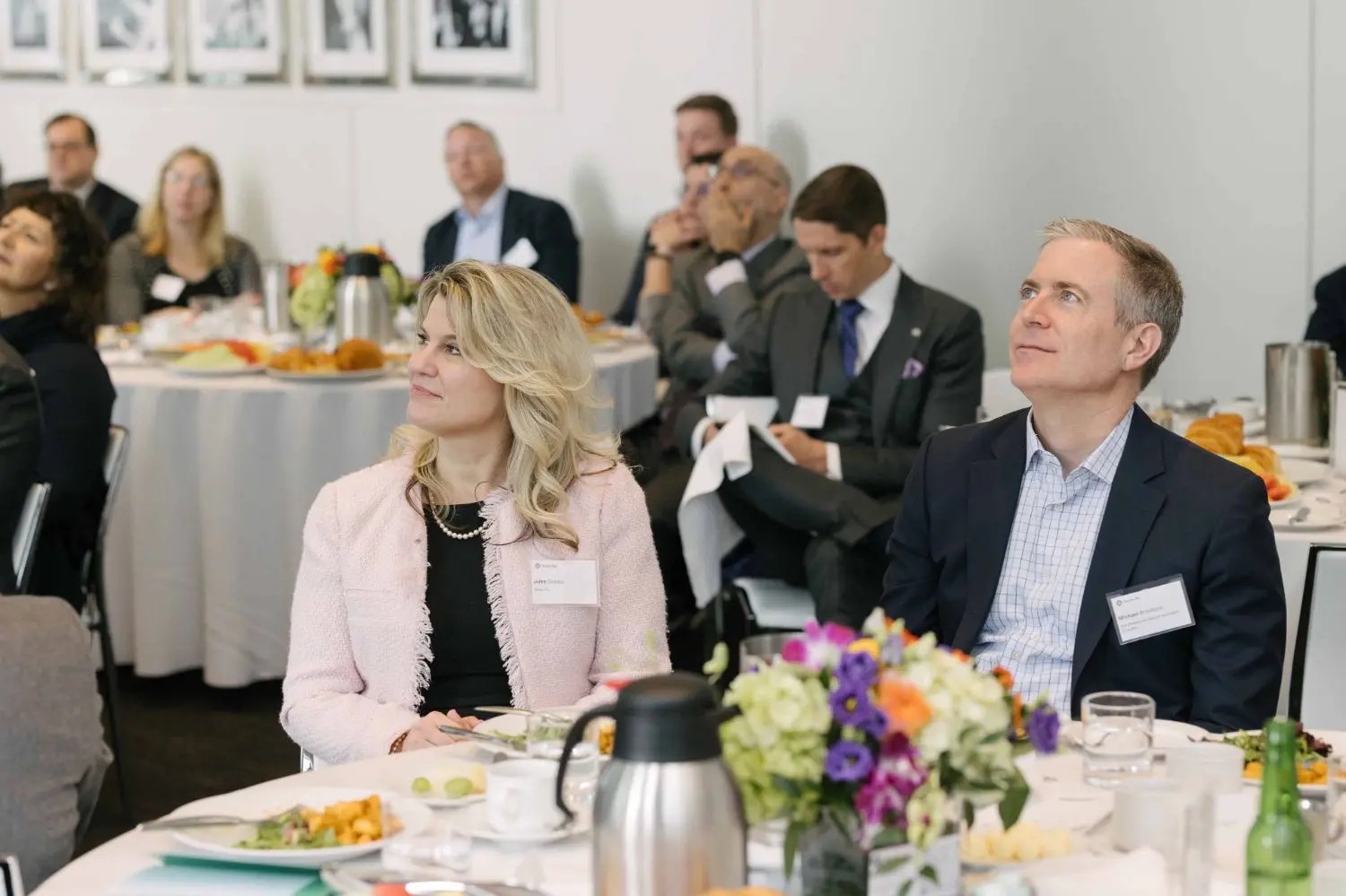 Photo from 37th annual Canadian Insurance Outlook Breakfast: people looking up.