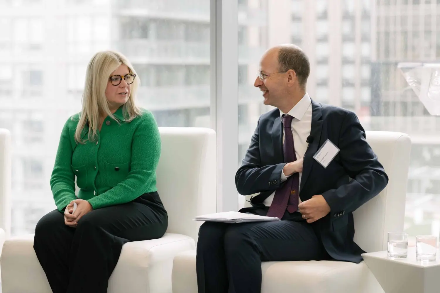 Photo from 37th annual Canadian Insurance Outlook Breakfast: people talking.