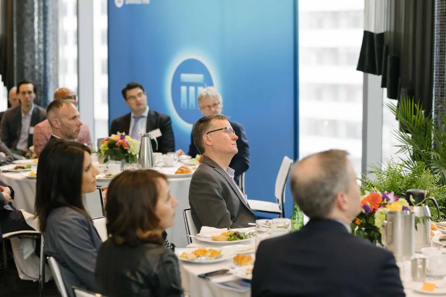 Photo from 37th annual Canadian Insurance Outlook Breakfast: people watching.