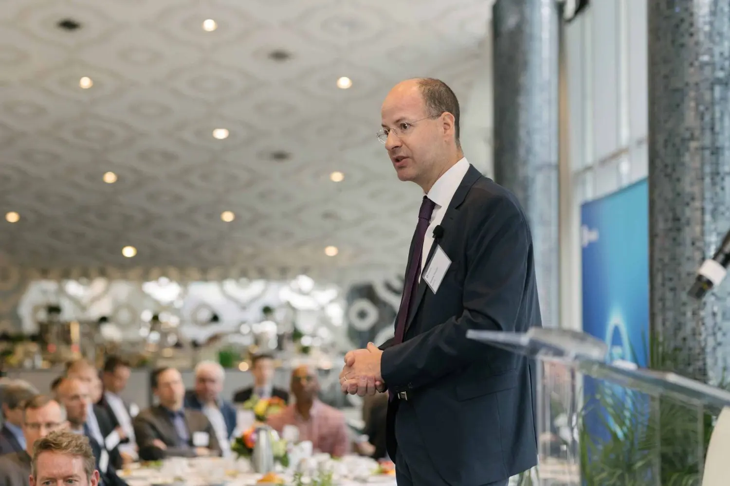 Photo from 37th annual Canadian Insurance Outlook Breakfast: man speaking.